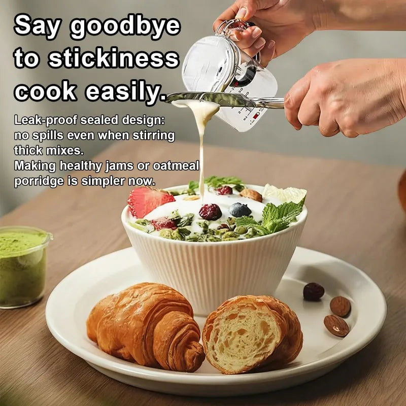 Person pouring a liquid into a bowl of oatmeal with fruit and nuts, with text about a leak-proof measuring cup.