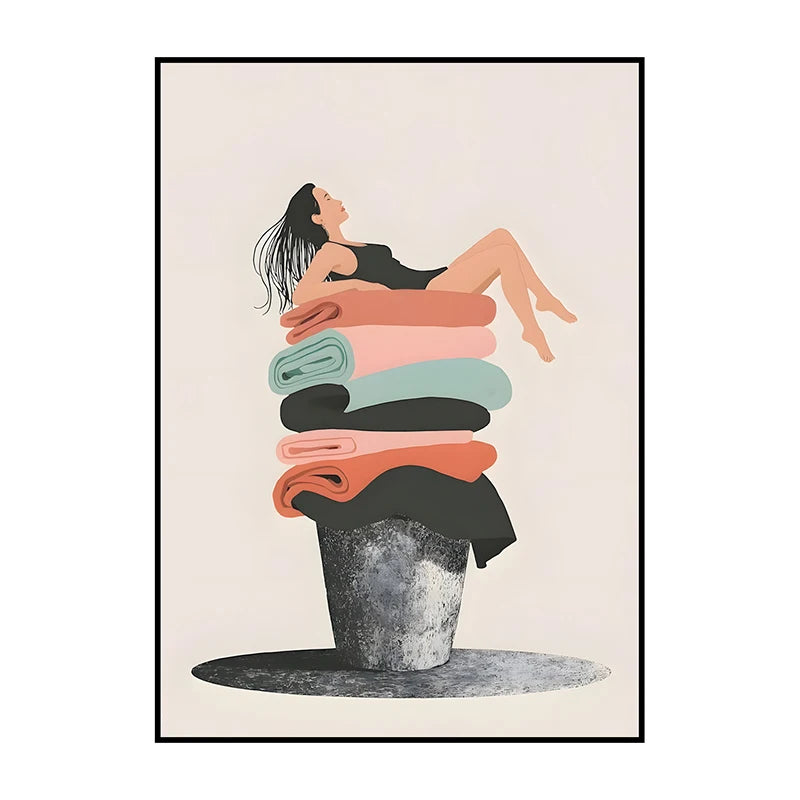 Framed artwork of a woman sitting on a stack of colorful towels.