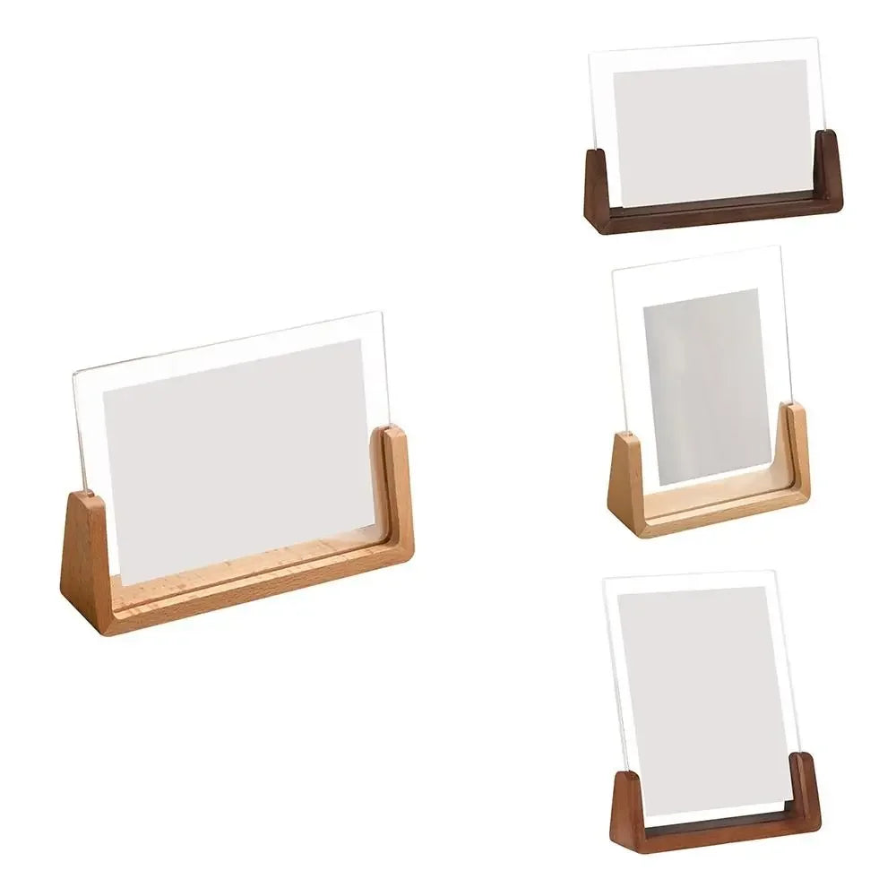 Set of four wooden photo frames with clear acrylic fronts on a white background
