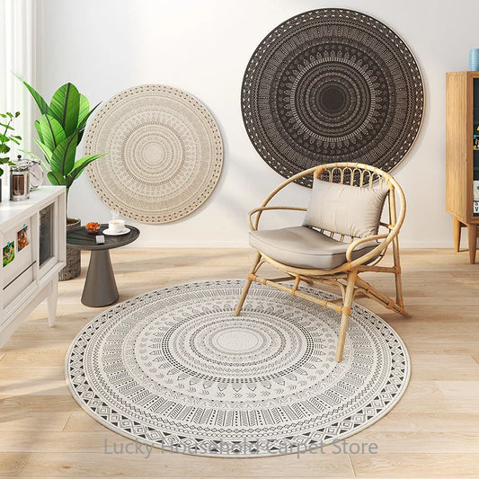 Round patterned rug in a room with a chair and decorative wall hangings.