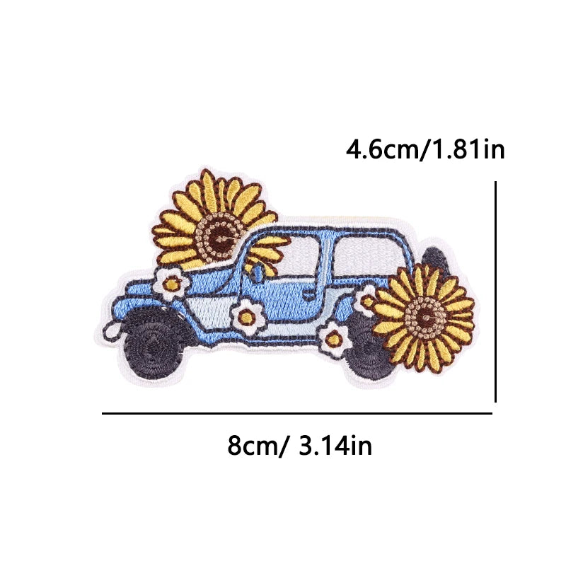 Embroidered patch of a blue car with sunflowers and measurements on a white background