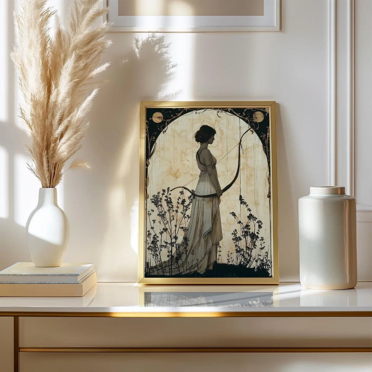 Framed artwork of a woman with a bow on a shelf with decorative items