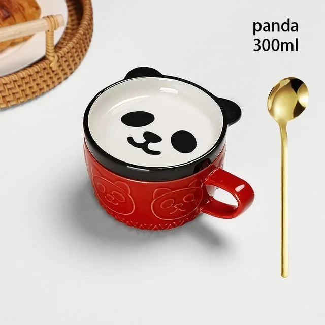 Red panda-shaped mug with a gold spoon on a light gray background