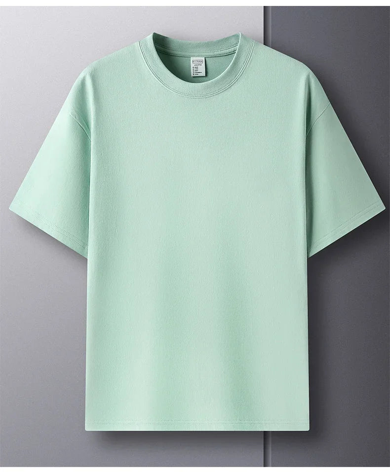 Light green t-shirt on a gray background