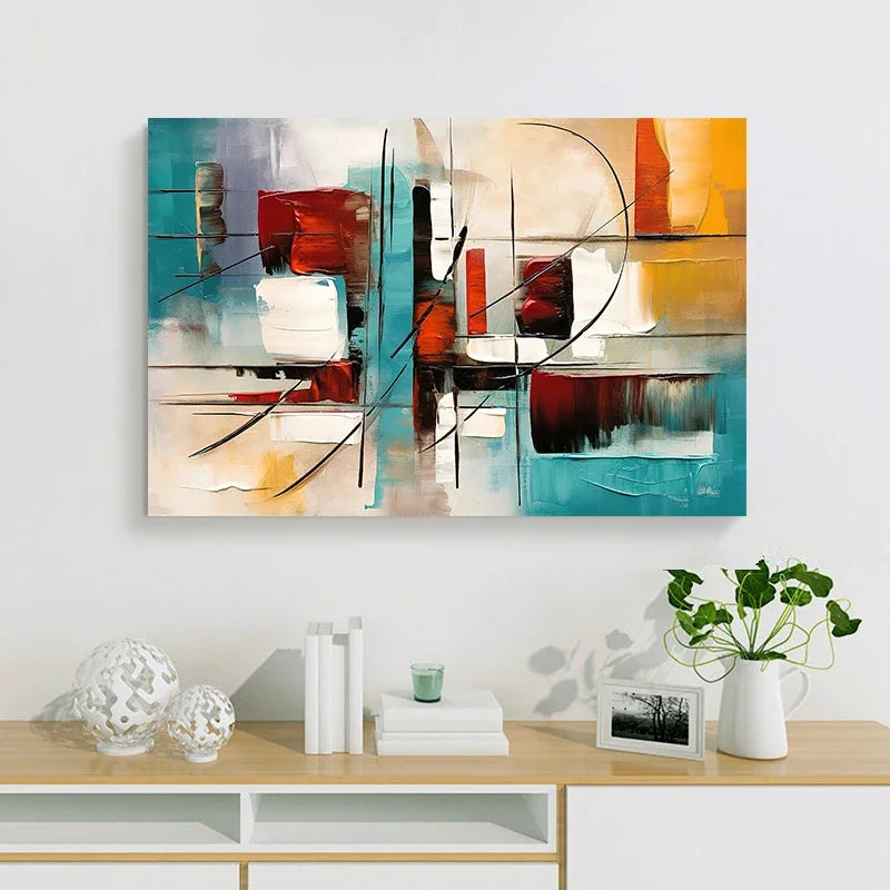 Abstract painting on a wall above a wooden console table with decorative items.