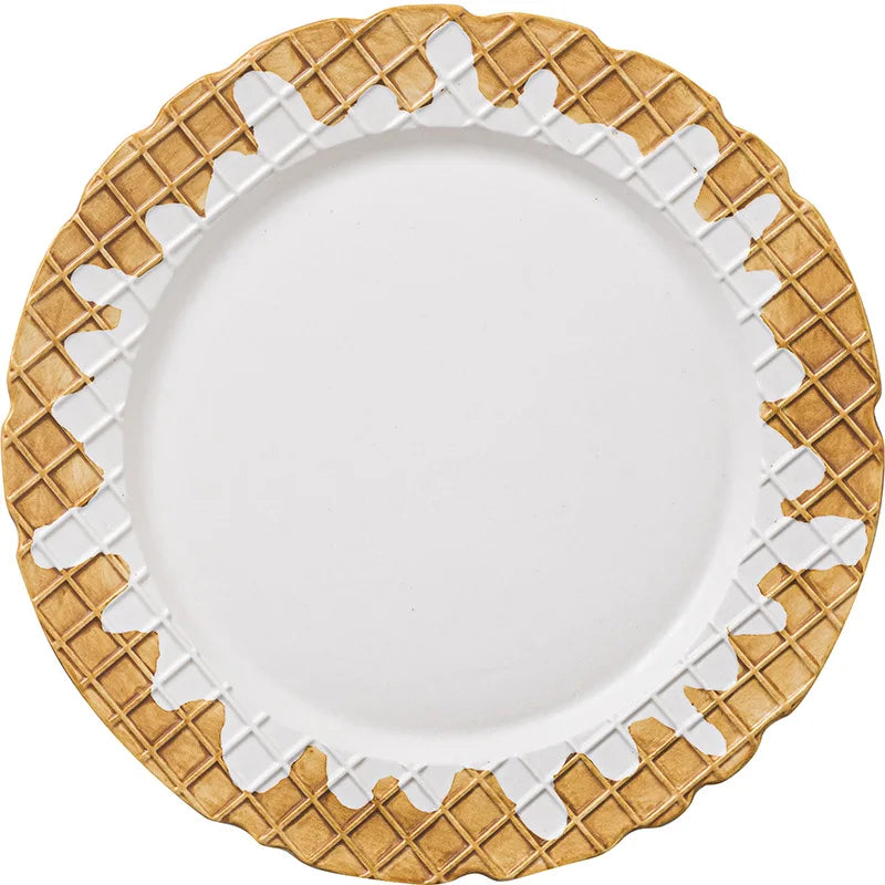White plate with a decorative brown rim on a white background