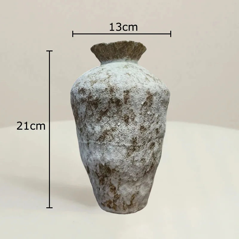 A small textured ceramic vase with a flared rim, shown on a plain light background with measurement lines and labels indicating 21 cm height and 13 cm width.