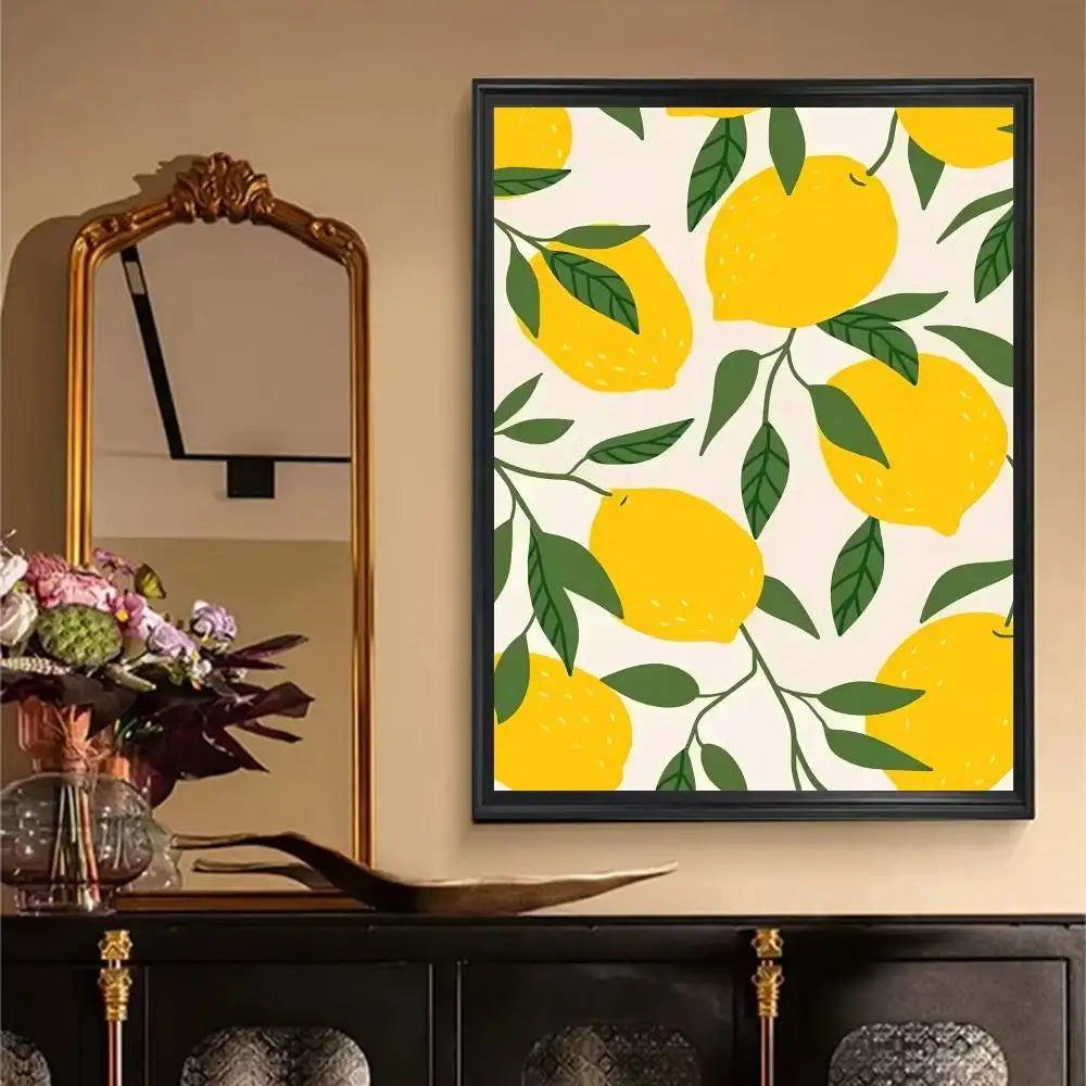 Framed artwork of lemons on a wall above a console table with decorative items.