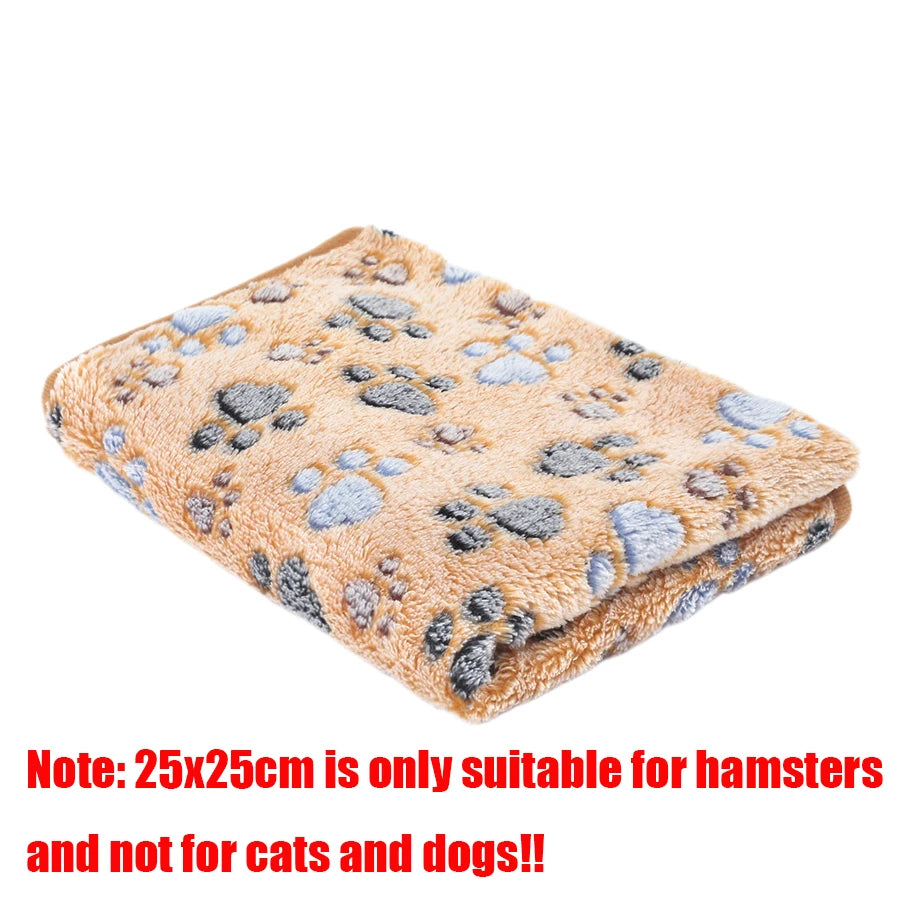 Folded blanket with paw print pattern on a white background