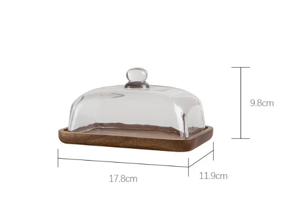 Glass pastry display dome with bamboo serving base