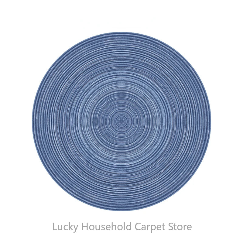 Round blue rug with concentric circle pattern on a white background, branded 'Lucky Household Carpet Store'.