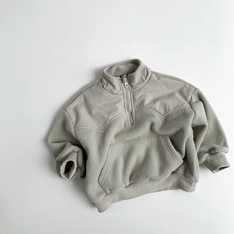 Light gray fleece pullover on a white background