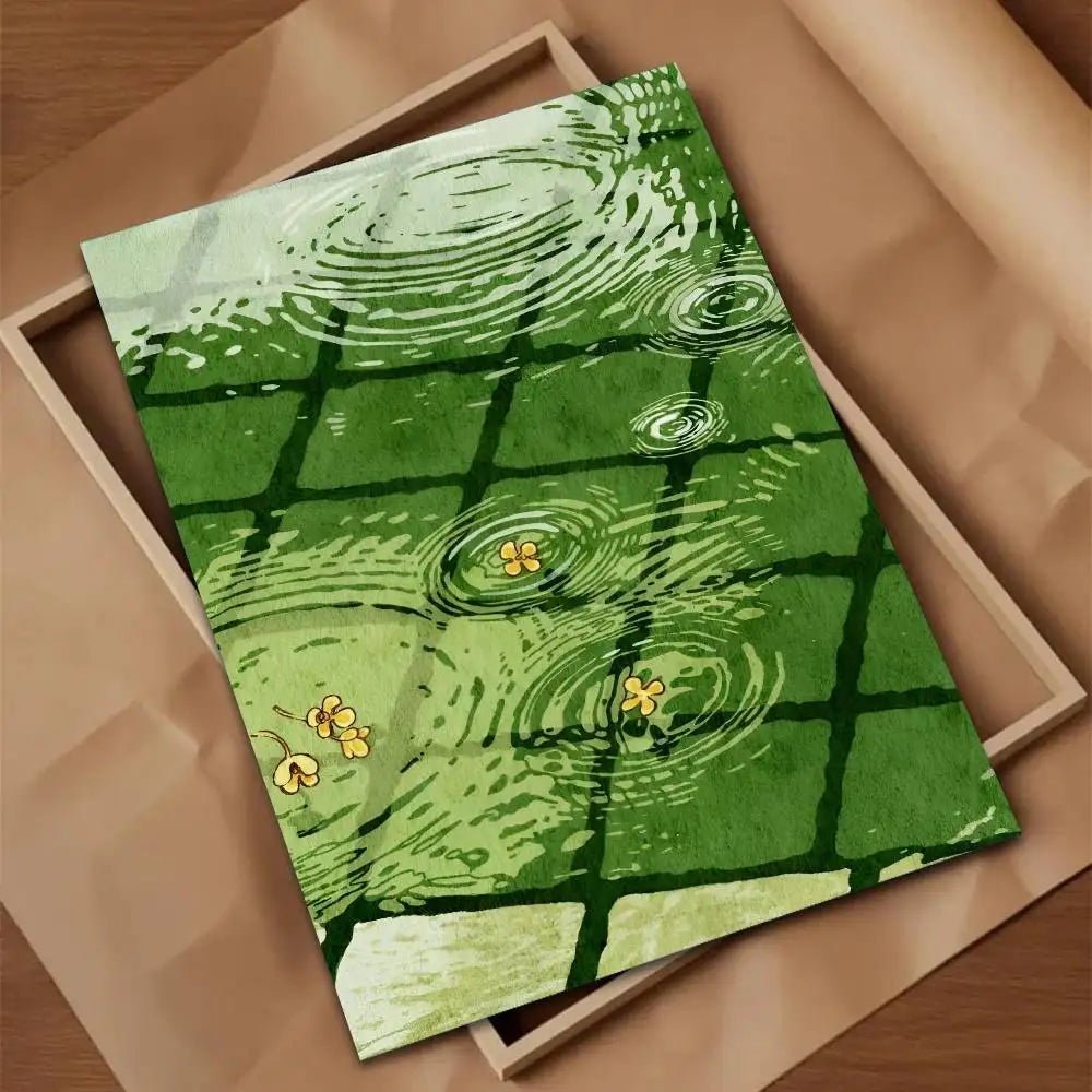 Poster with water droplets and flowers design on a green checkered background, placed on a brown surface.
