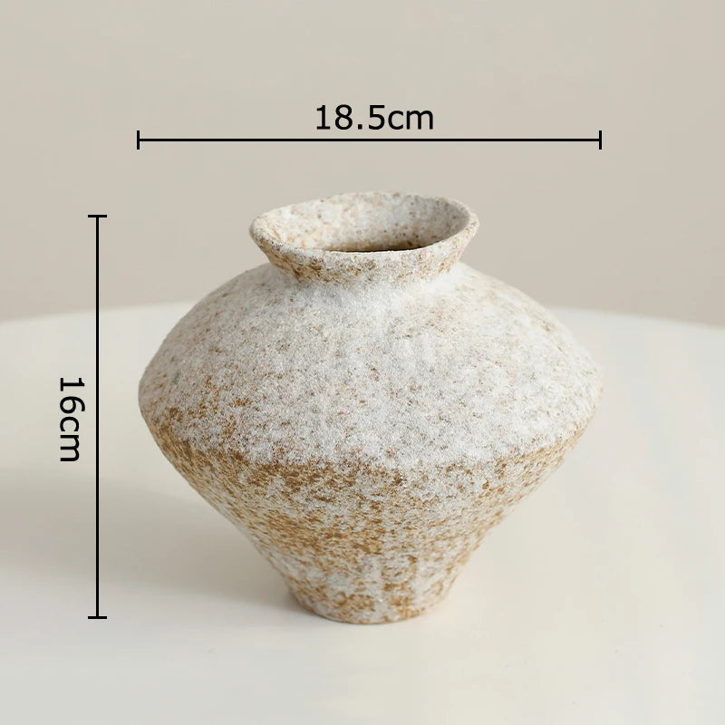 Vintage-style ceramic vase with dimensions on a plain background