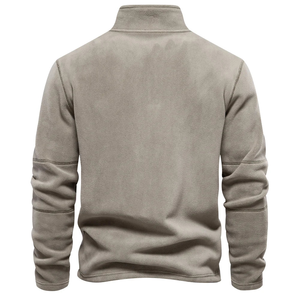 Beige fleece pullover on a white background