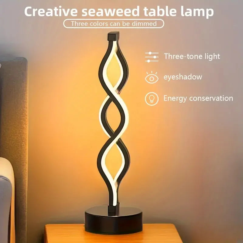 Creative seaweed table lamp with three-tone light on a wooden surface