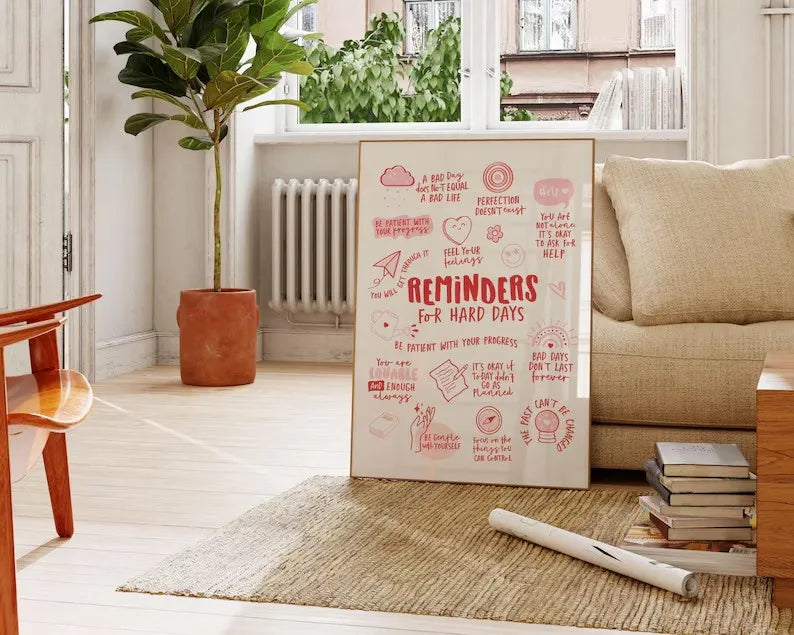 Room interior with a decorative board titled 'Reminders for Hard Days' in a living room setting.