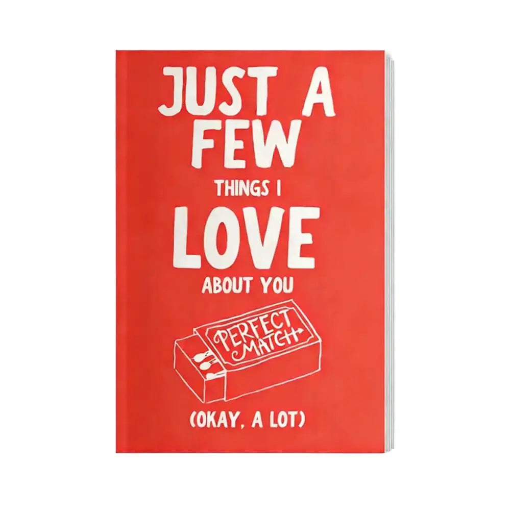 Red notebook with white text and a matchbox graphic on a white background