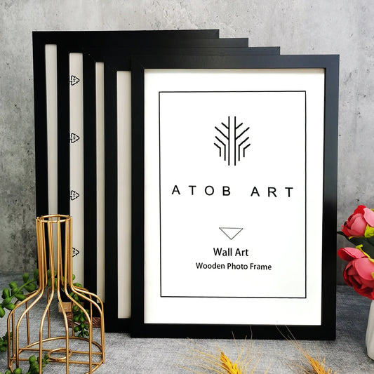Modern wooden picture frame set with five MDF frames suitable for displaying photographs, artwork, certificates and personalised prints on walls or tabletops.