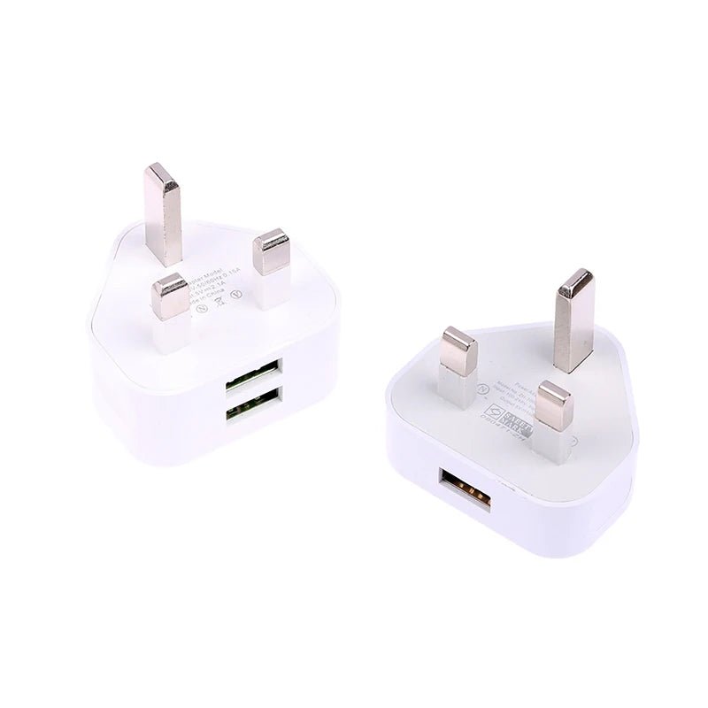 Two white USB travel adapters on a white background