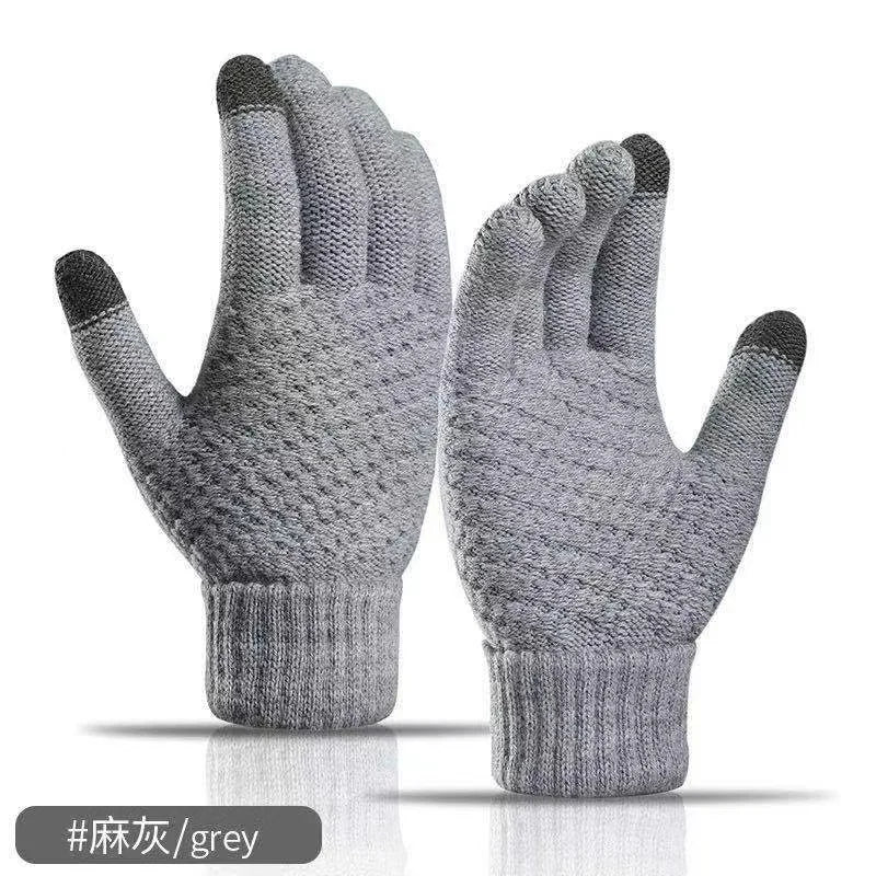 Pair of gray gloves with black tips on a white background