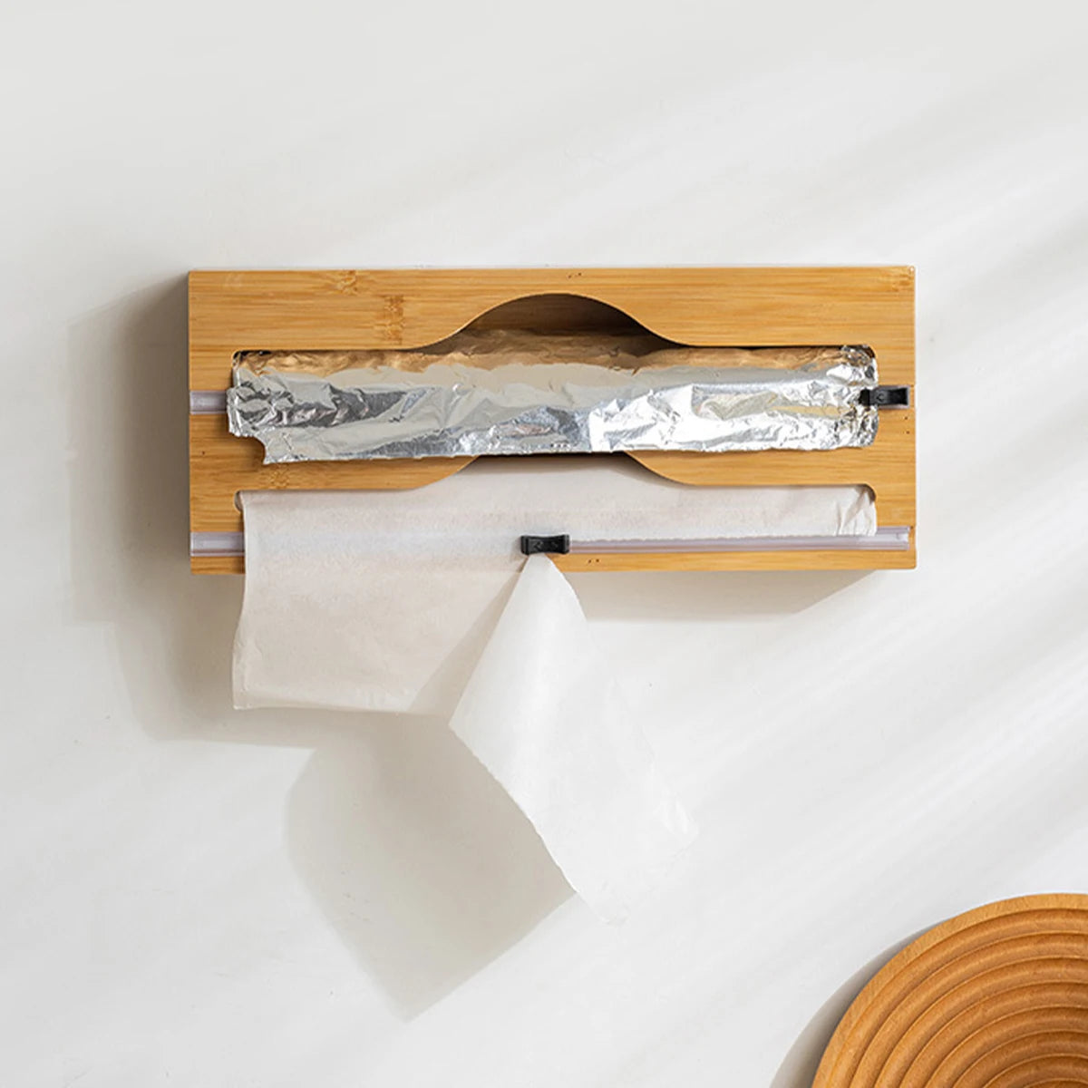 Bamboo kitchen wrap dispenser with integrated foil and cling film cutter