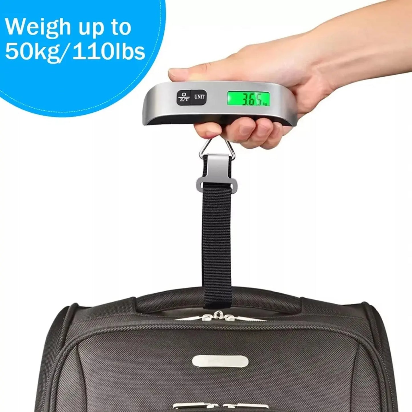 Hand holding a digital luggage scale on a gray suitcase with text indicating weight capacity.