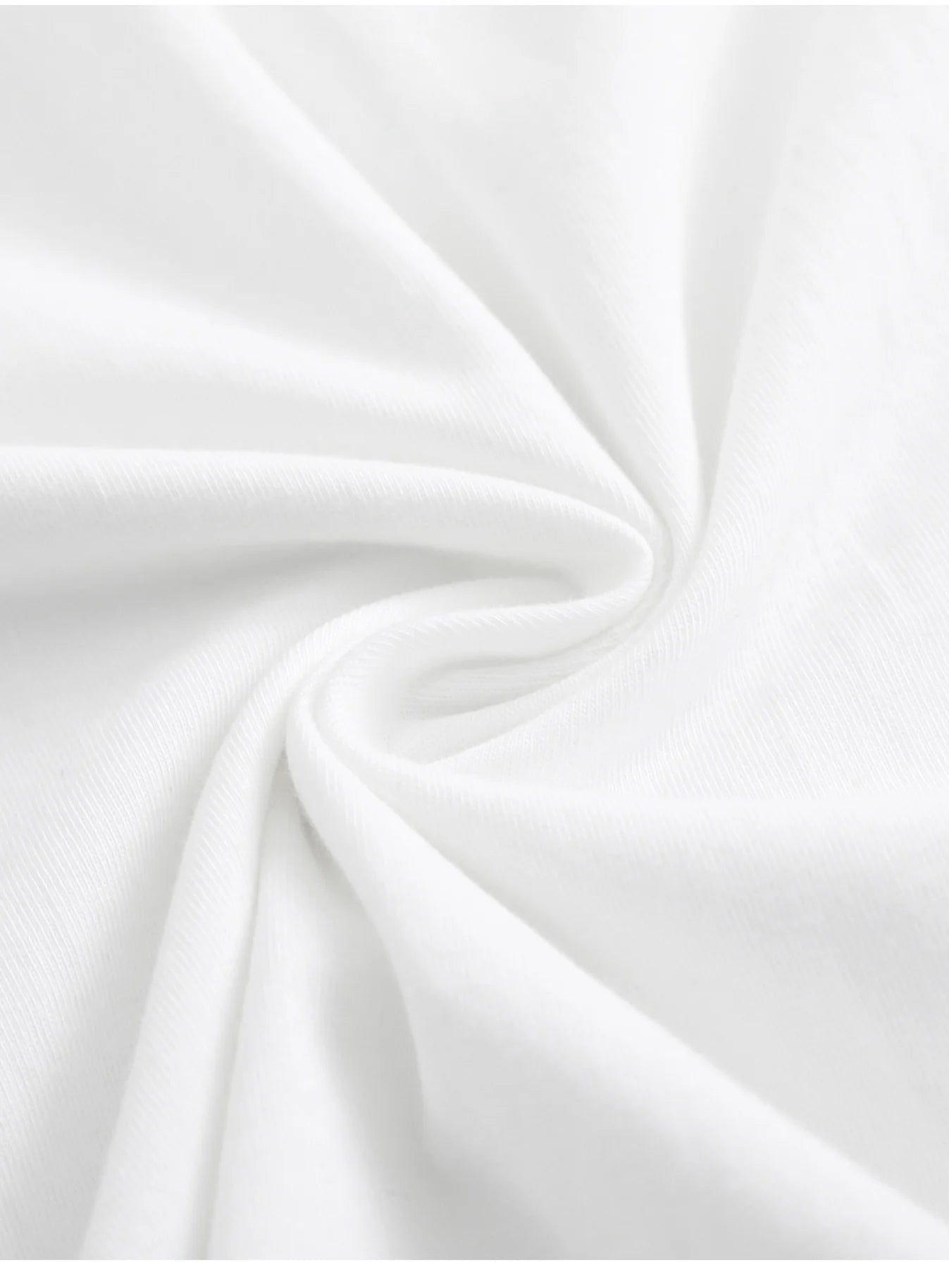 Close-up of white fabric with folds