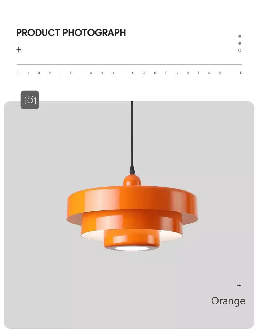 Orange pendant light on a gray background
