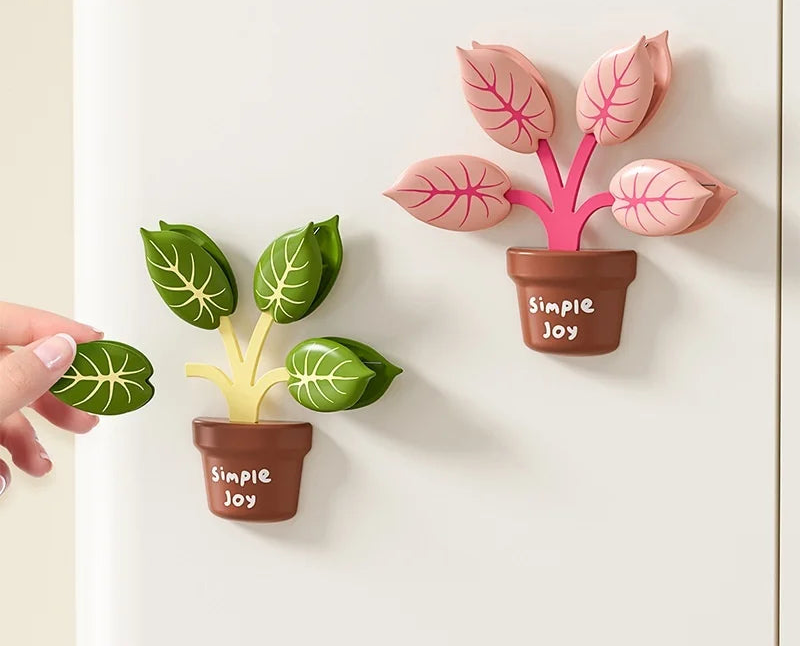 Magnetic sealing clips shaped like potted plants with 'Simple Joy' text on a white background.