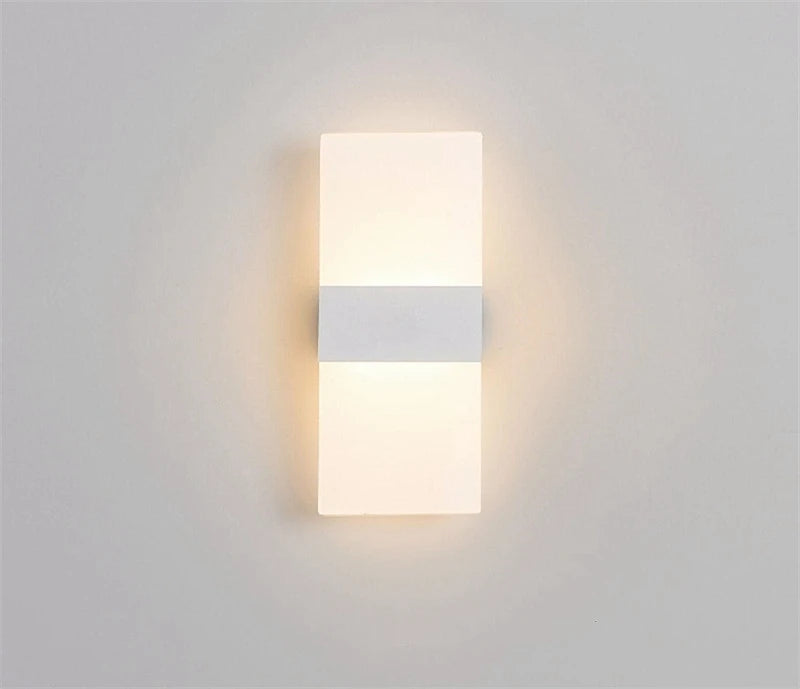 Rectangular wall light fixture on a plain wall
