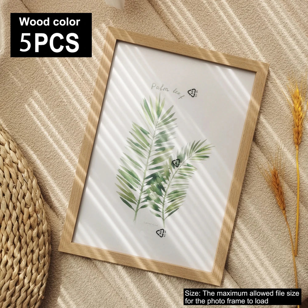 Wooden photo frame with a leaf design on a textured surface