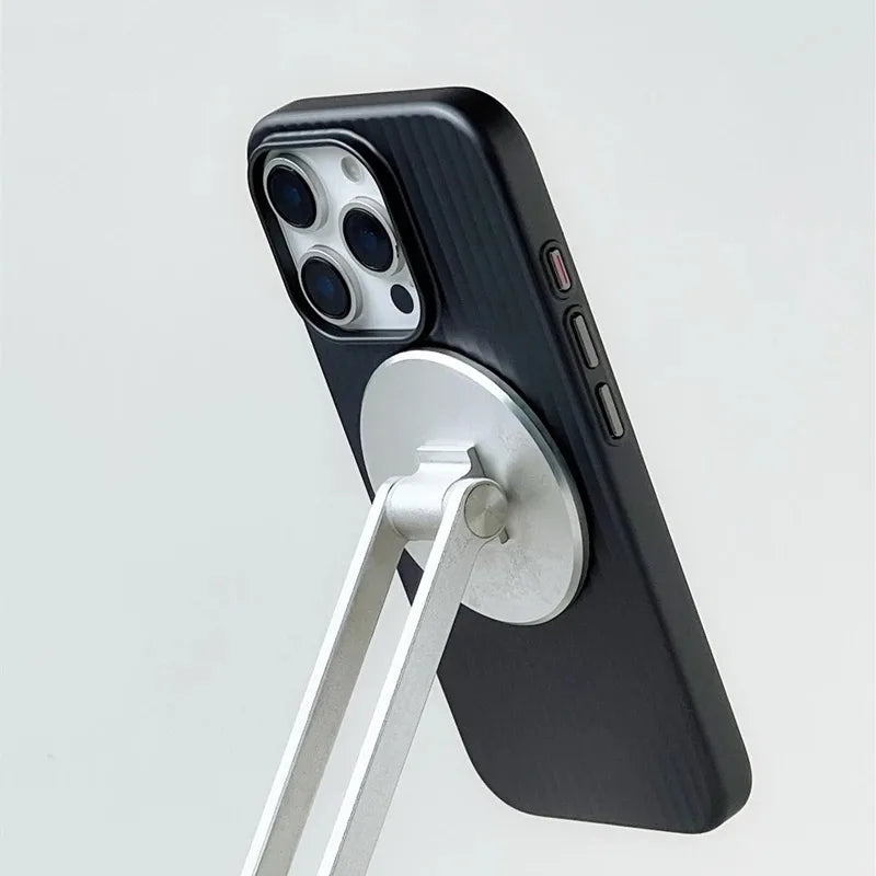 Black phone case with a stand on a light gray background
