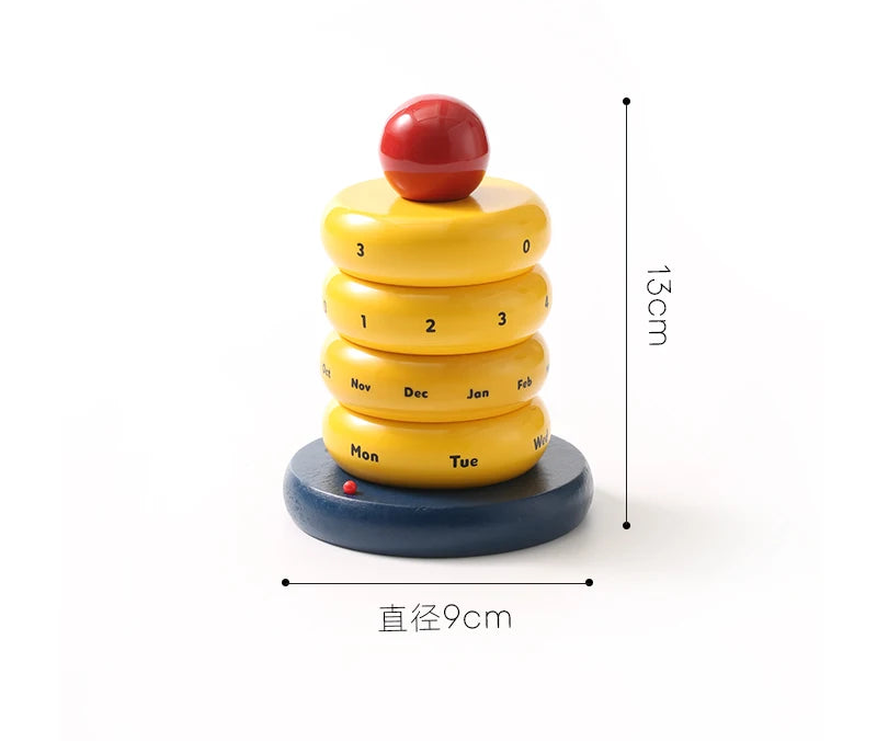 Colorful rotating cake calendar on a white surface with a blurred background with measurements