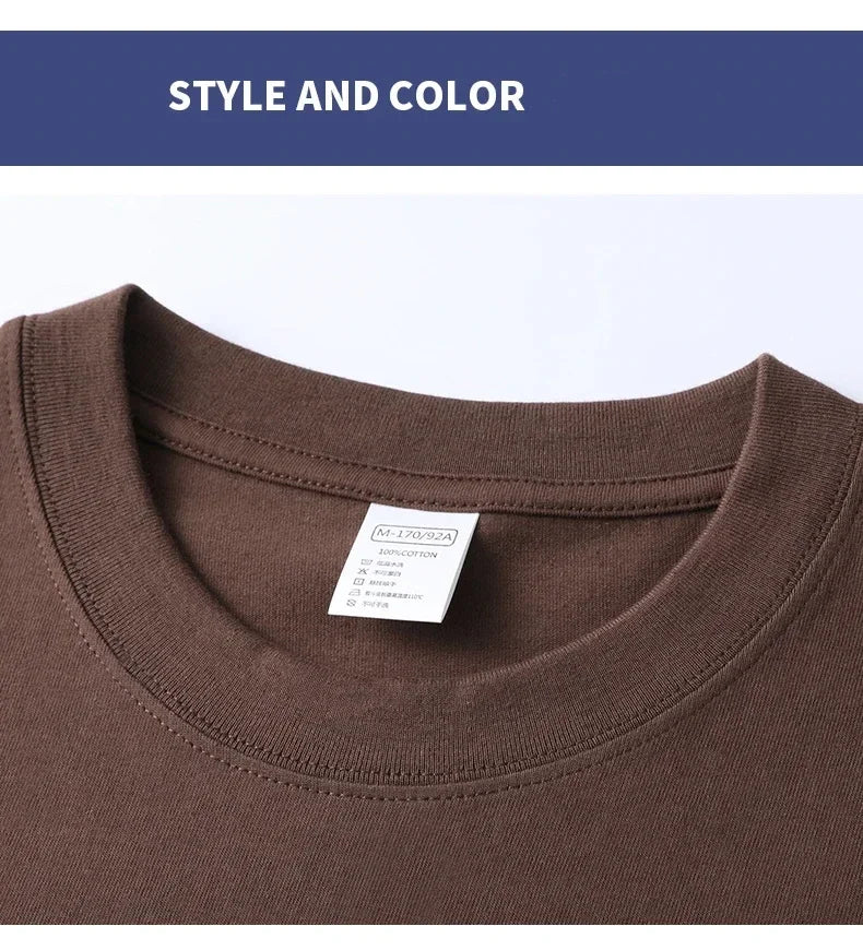 Close-up of a brown t-shirt collar with a visible label on a white background.