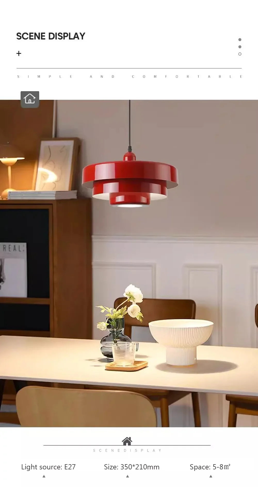 Red pendant light fixture in a dining room setting with a neutral color scheme.