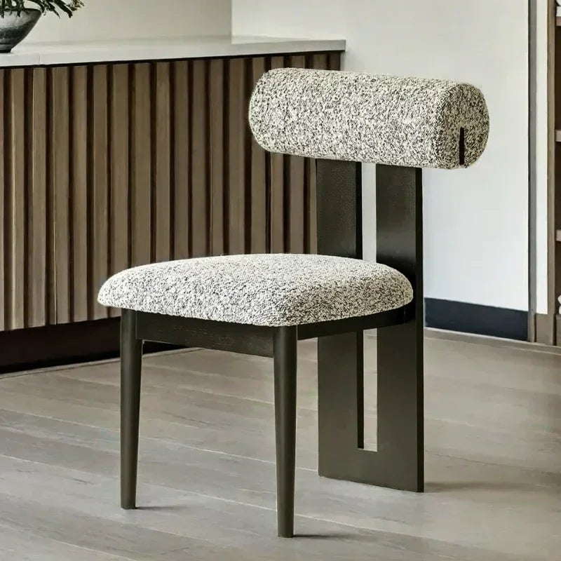 Modern chair with patterned seat and backrest in a minimalistic setting
