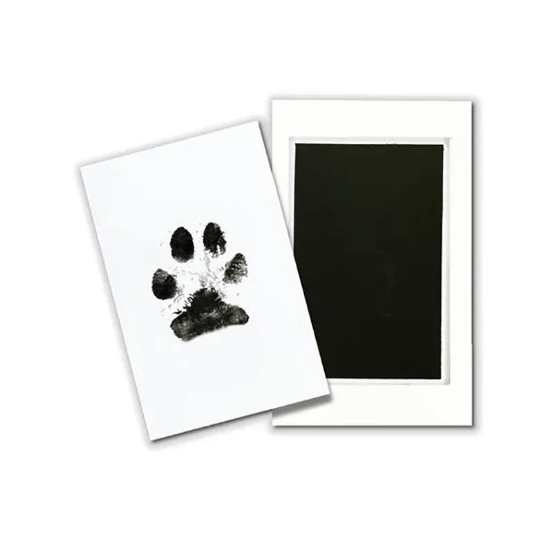 White card with a black paw print on a white background