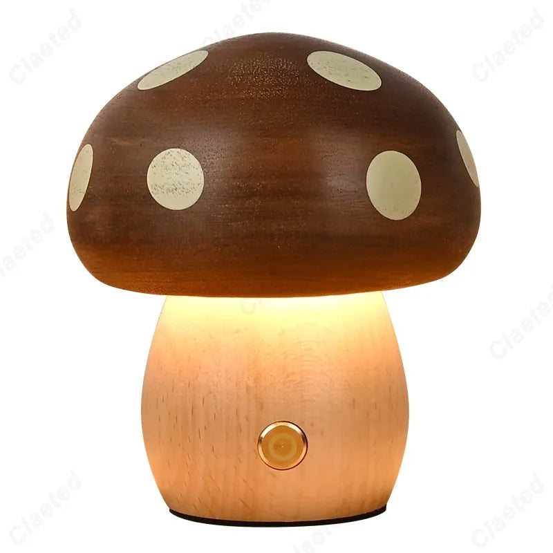 Mushroom-shaped night light with a warm glow on a white background