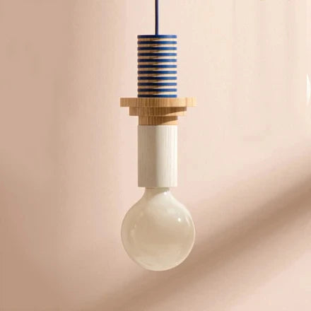 Light bulb with wooden and striped design on a beige background