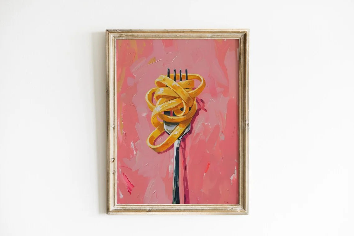 Framed artwork of a fork with noodles on a pink background