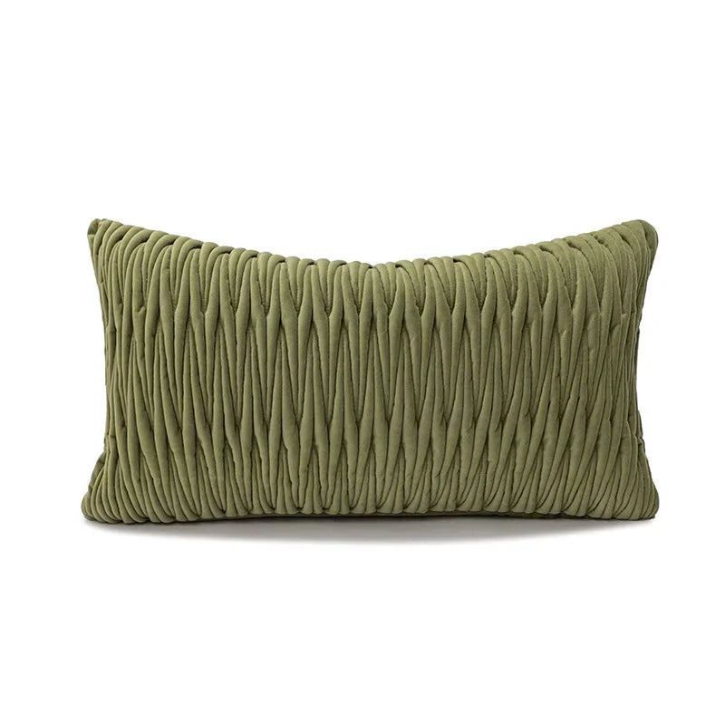 Green textured pillow on a white background
