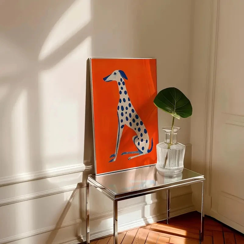 Artistic depiction of a dog on an orange background with a plant on a table.