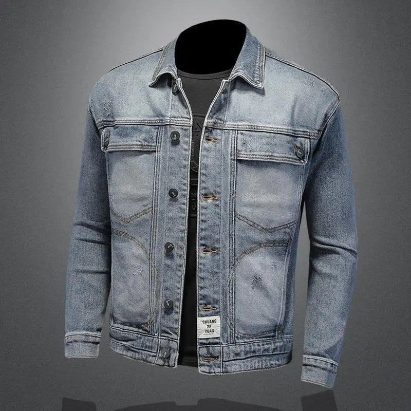 Blue denim jacket on a gray background