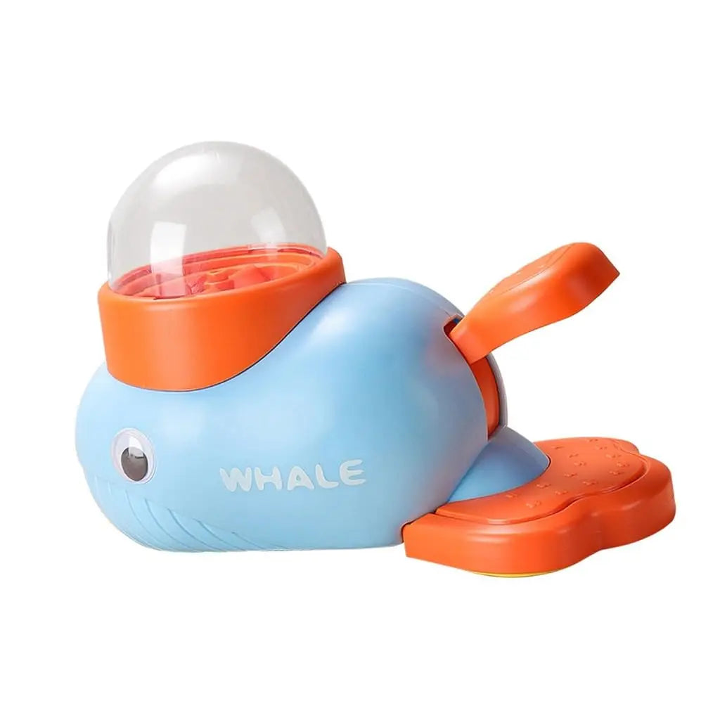 Toy whale with orange and blue colors on a white background
