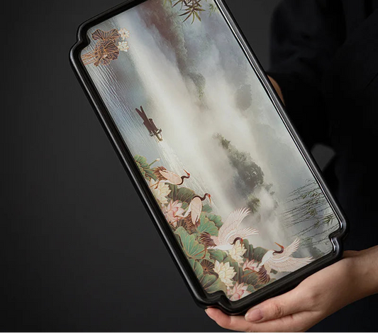 Serving Tray with artistic design held by a person, featuring the brand 'Chau Honor'.