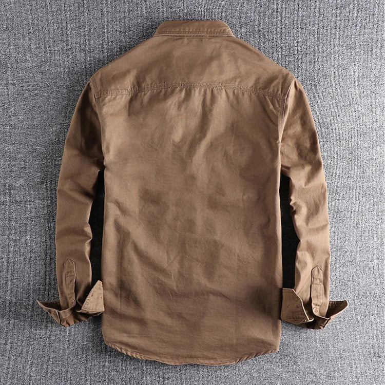 Brown shirt on a gray textured background
