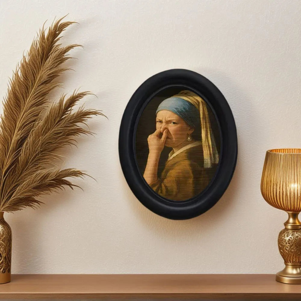 Small framed parody artwork featuring a humorous expression in a black oval frame, designed as quirky bathroom and home wall décor.