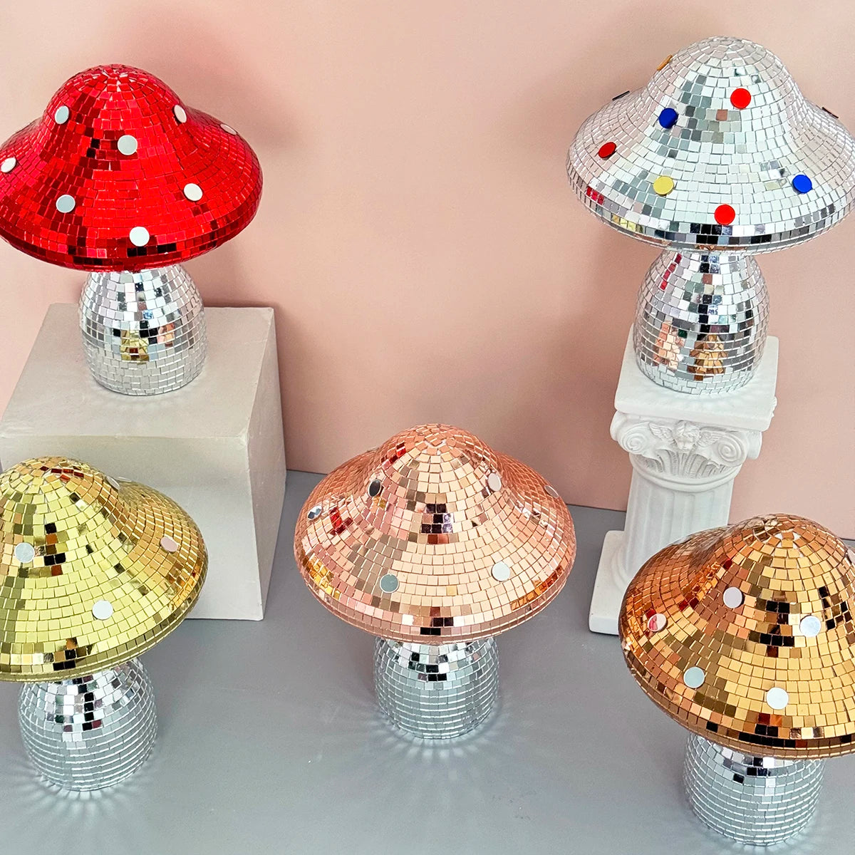 Colorful disco mushroom ornaments on a light background