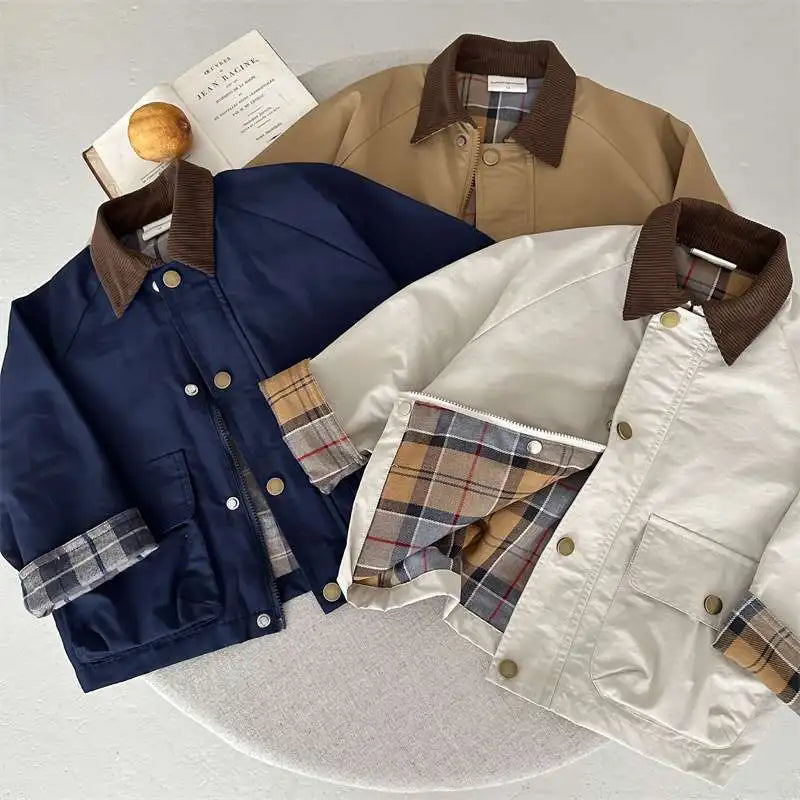 Three jackets in navy, beige, and white with plaid lining on a light gray background.